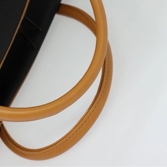 Yves Saint Laurent Elegant Black and Tan Travel Bag - Picture 8 of 12